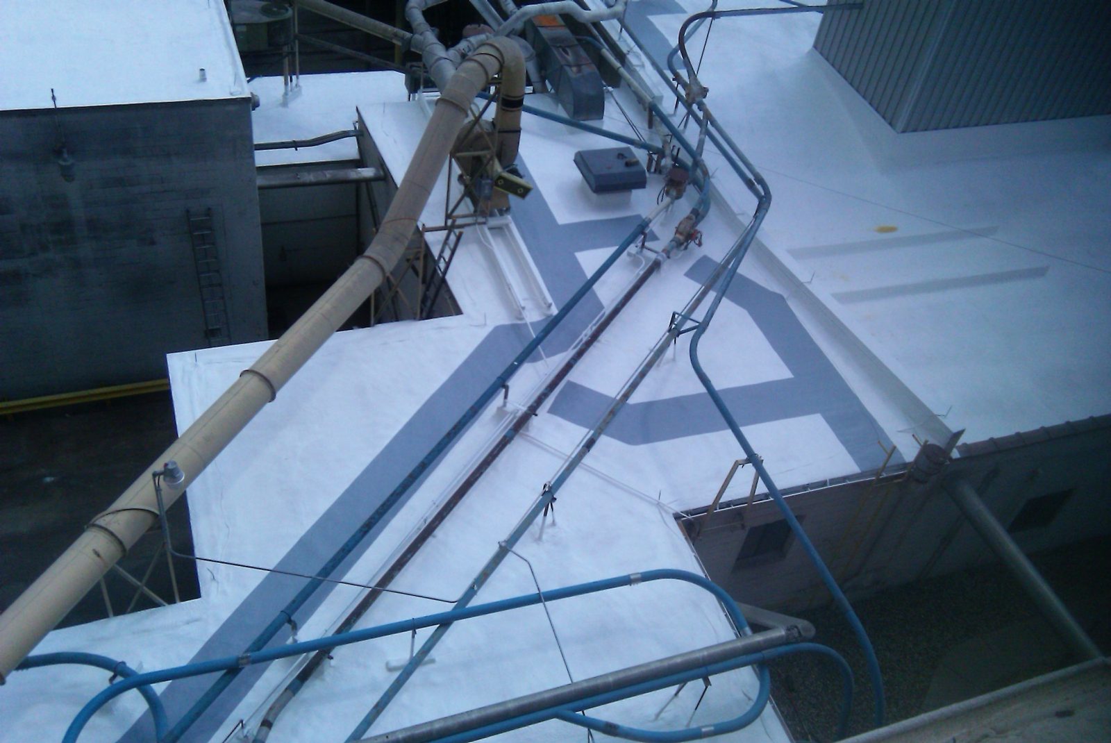 Concrete deck waterproofed with a sprayed polyurea membrane